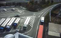 Additional lane markings leading to the main road